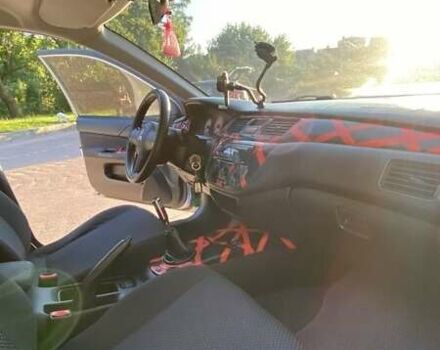 Сірий Міцубісі Lancer, об'ємом двигуна 1.6 л та пробігом 211 тис. км за 4200 $, фото 1 на Automoto.ua
