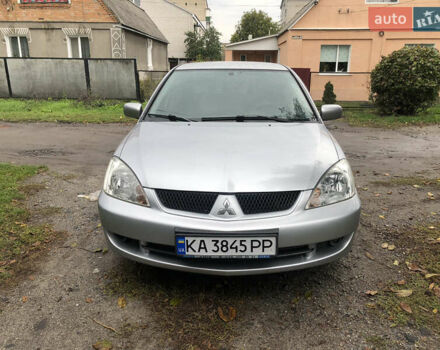Сірий Міцубісі Lancer, об'ємом двигуна 1.58 л та пробігом 240 тис. км за 4299 $, фото 1 на Automoto.ua