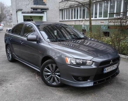 Серый Мицубиси Лансер, объемом двигателя 2 л и пробегом 186 тыс. км за 6000 $, фото 1 на Automoto.ua