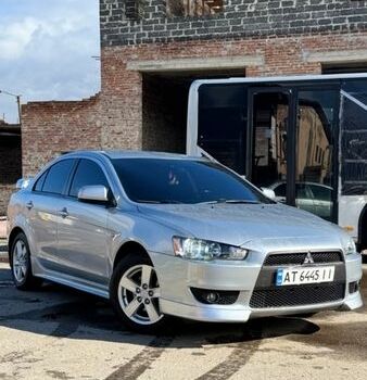 Серый Мицубиси Лансер, объемом двигателя 2 л и пробегом 199 тыс. км за 6850 $, фото 1 на Automoto.ua
