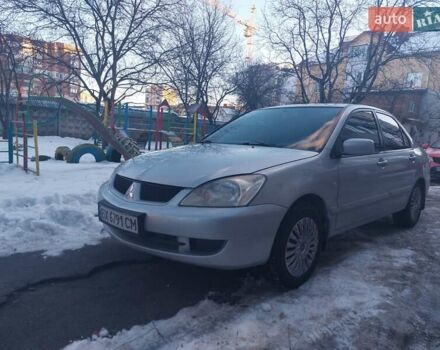 Серый Мицубиси Лансер, объемом двигателя 1.58 л и пробегом 196 тыс. км за 4300 $, фото 1 на Automoto.ua