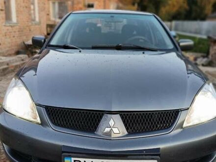 Мицубиси Лансер 2008 в Ромнах на Automoto.ua Серый Мицубиси Лансер, объемом двигателя 1.6 л и пробегом 234 тыс. км за 4300 $, фото 1 на Automoto.ua