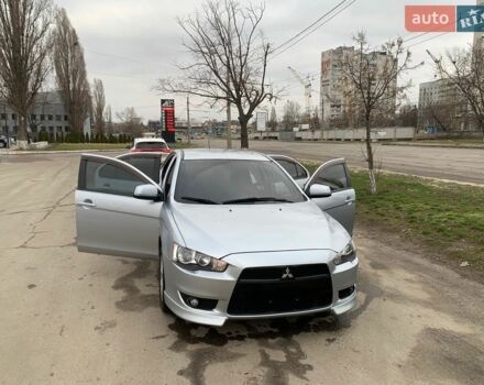 Серый Мицубиси Лансер, объемом двигателя 2 л и пробегом 152 тыс. км за 7500 $, фото 1 на Automoto.ua