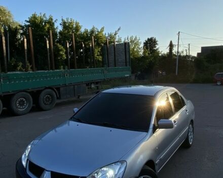 Сірий Міцубісі Lancer, об'ємом двигуна 1.6 л та пробігом 211 тис. км за 4200 $, фото 1 на Automoto.ua