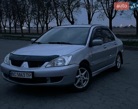 Серый Мицубиси Лансер, объемом двигателя 1.6 л и пробегом 272 тыс. км за 3000 $, фото 1 на Automoto.ua