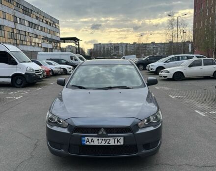 Серый Мицубиси Лансер, объемом двигателя 1.5 л и пробегом 250 тыс. км за 3850 $, фото 1 на Automoto.ua