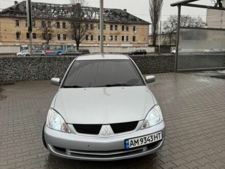 Серый Мицубиси Лансер, объемом двигателя 1.6 л и пробегом 158 тыс. км за 3150 $, фото 1 на Automoto.ua