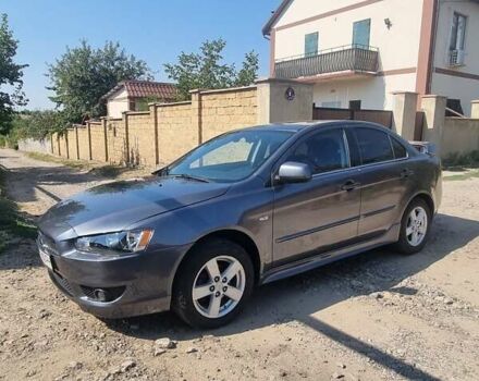 Сірий Міцубісі Lancer, об'ємом двигуна 1.5 л та пробігом 172 тис. км за 5799 $, фото 1 на Automoto.ua