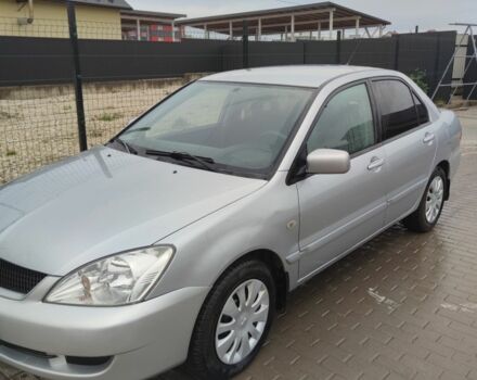 Серый Мицубиси Лансер, объемом двигателя 1.6 л и пробегом 225 тыс. км за 3100 $, фото 1 на Automoto.ua