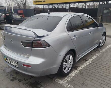Серый Мицубиси Лансер, объемом двигателя 2 л и пробегом 220 тыс. км за 5700 $, фото 1 на Automoto.ua