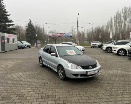 Серый Мицубиси Лансер, объемом двигателя 1.6 л и пробегом 205 тыс. км за 5400 $, фото 1 на Automoto.ua