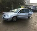 Сірий Міцубісі Lancer, об'ємом двигуна 1.6 л та пробігом 190 тис. км за 5609 $, фото 1 на Automoto.ua