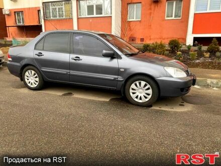 Міцубісі Lancer 2008 у Харкові на Automoto.ua Сірий Міцубісі Lancer, об'ємом двигуна 1.6 л та пробігом 170 тис. км за 5100 $, фото 1 на Automoto.ua