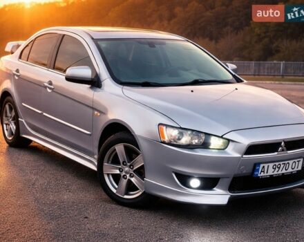 Серый Мицубиси Лансер, объемом двигателя 2 л и пробегом 325 тыс. км за 6300 $, фото 1 на Automoto.ua