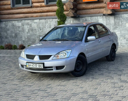 Сірий Міцубісі Lancer, об'ємом двигуна 1.6 л та пробігом 221 тис. км за 3700 $, фото 1 на Automoto.ua