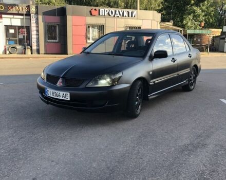 Сірий Міцубісі Lancer, об'ємом двигуна 1.6 л та пробігом 145 тис. км за 4516 $, фото 1 на Automoto.ua