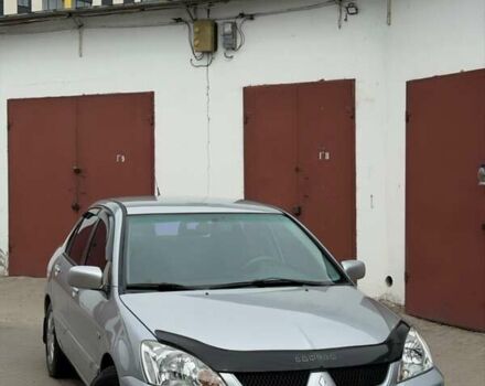 Серый Мицубиси Лансер, объемом двигателя 1.58 л и пробегом 199 тыс. км за 3650 $, фото 1 на Automoto.ua