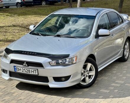 Серый Мицубиси Лансер, объемом двигателя 2 л и пробегом 183 тыс. км за 6999 $, фото 1 на Automoto.ua