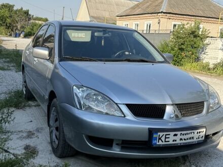 Сірий Міцубісі Lancer, об'ємом двигуна 1.6 л та пробігом 182 тис. км за 4200 $, фото 1 на Automoto.ua