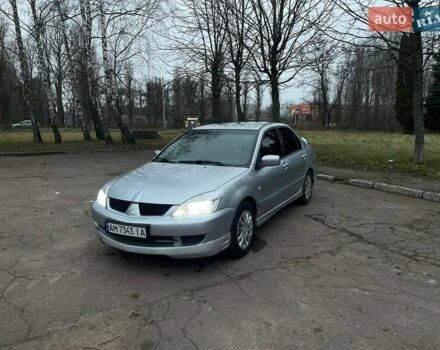 Сірий Міцубісі Lancer, об'ємом двигуна 1.6 л та пробігом 254 тис. км за 3800 $, фото 1 на Automoto.ua