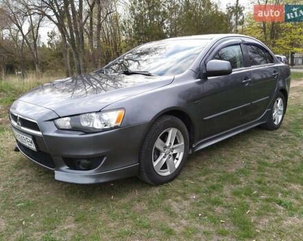 Сірий Міцубісі Lancer, об'ємом двигуна 1.47 л та пробігом 243 тис. км за 6200 $, фото 1 на Automoto.ua
