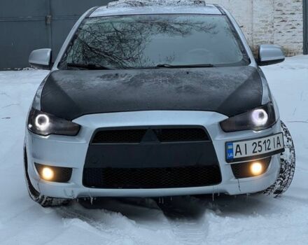 Серый Мицубиси Лансер, объемом двигателя 2 л и пробегом 250 тыс. км за 5800 $, фото 1 на Automoto.ua