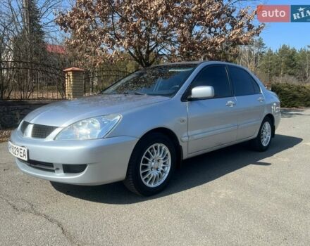 Серый Мицубиси Лансер, объемом двигателя 1.58 л и пробегом 255 тыс. км за 4300 $, фото 1 на Automoto.ua