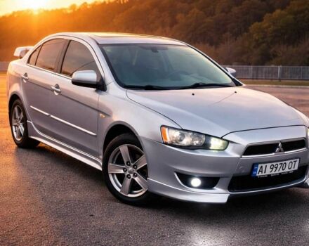 Серый Мицубиси Лансер, объемом двигателя 2 л и пробегом 325 тыс. км за 6300 $, фото 1 на Automoto.ua