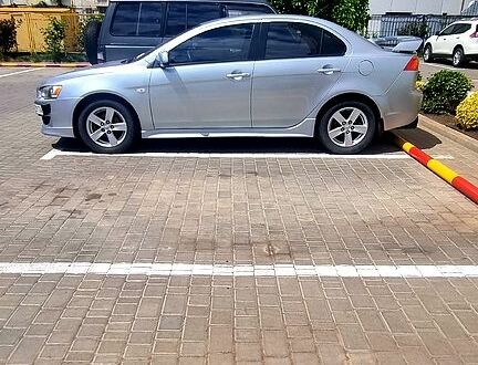 Серый Мицубиси Лансер, объемом двигателя 2 л и пробегом 274 тыс. км за 6300 $, фото 1 на Automoto.ua