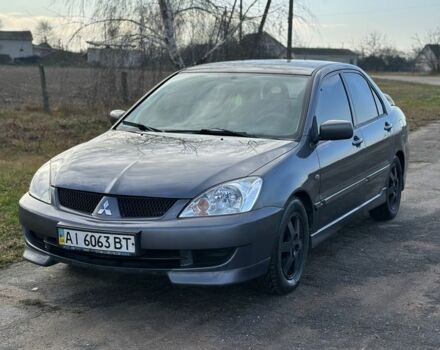 Сірий Міцубісі Lancer, об'ємом двигуна 1.6 л та пробігом 114 тис. км за 4000 $, фото 1 на Automoto.ua