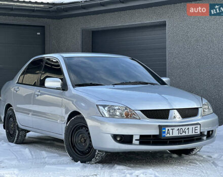 Серый Мицубиси Лансер, объемом двигателя 1.6 л и пробегом 224 тыс. км за 4750 $, фото 1 на Automoto.ua