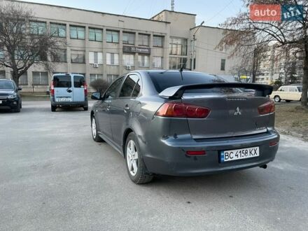 Серый Мицубиси Лансер, объемом двигателя 2 л и пробегом 425 тыс. км за 5200 $, фото 1 на Automoto.ua