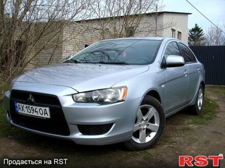 Серый Мицубиси Лансер, объемом двигателя 1.5 л и пробегом 215 тыс. км за 5700 $, фото 1 на Automoto.ua