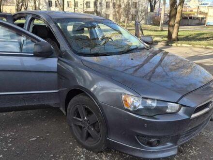 Серый Мицубиси Лансер, объемом двигателя 1.5 л и пробегом 180 тыс. км за 5300 $, фото 1 на Automoto.ua