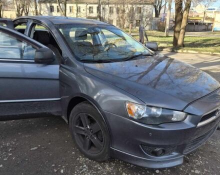 Серый Мицубиси Лансер, объемом двигателя 1.5 л и пробегом 180 тыс. км за 5300 $, фото 1 на Automoto.ua