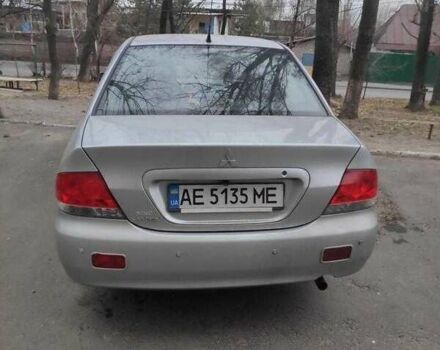 Серый Мицубиси Лансер, объемом двигателя 1.6 л и пробегом 166 тыс. км за 5200 $, фото 1 на Automoto.ua
