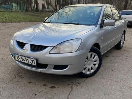 Сірий Міцубісі Lancer, об'ємом двигуна 1.6 л та пробігом 206 тис. км за 4250 $, фото 1 на Automoto.ua