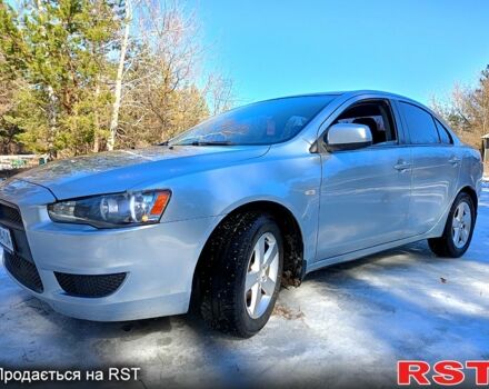 Серый Мицубиси Лансер, объемом двигателя 1.5 л и пробегом 214 тыс. км за 4999 $, фото 1 на Automoto.ua