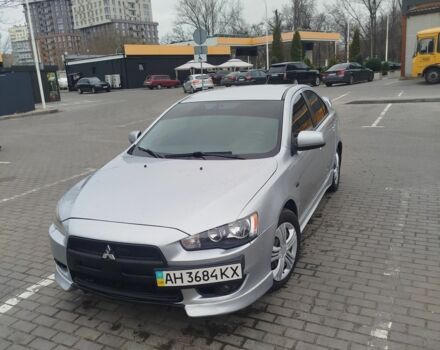 Серый Мицубиси Лансер, объемом двигателя 2 л и пробегом 220 тыс. км за 5700 $, фото 1 на Automoto.ua
