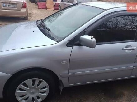 Сірий Міцубісі Lancer, об'ємом двигуна 1.6 л та пробігом 320 тис. км за 4167 $, фото 1 на Automoto.ua