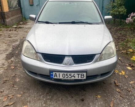Сірий Міцубісі Lancer, об'ємом двигуна 1.6 л та пробігом 336 тис. км за 3950 $, фото 1 на Automoto.ua