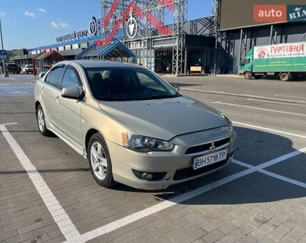 Серый Мицубиси Лансер, объемом двигателя 2 л и пробегом 157 тыс. км за 4800 $, фото 1 на Automoto.ua