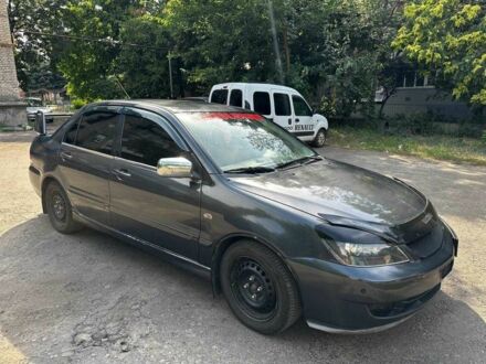 Сірий Міцубісі Lancer, об'ємом двигуна 1.6 л та пробігом 999 тис. км за 3200 $, фото 1 на Automoto.ua