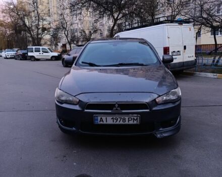 Серый Мицубиси Лансер, объемом двигателя 2 л и пробегом 345 тыс. км за 6500 $, фото 1 на Automoto.ua