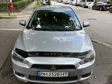 Серый Мицубиси Лансер, объемом двигателя 2 л и пробегом 183 тыс. км за 7500 $, фото 1 на Automoto.ua