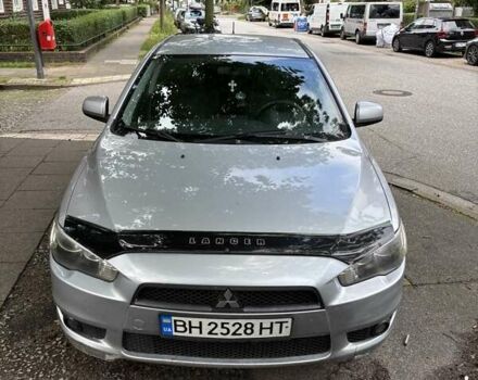 Серый Мицубиси Лансер, объемом двигателя 2 л и пробегом 183 тыс. км за 7500 $, фото 1 на Automoto.ua