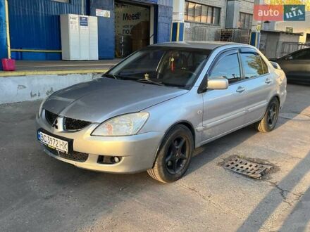 Сірий Міцубісі Lancer, об'ємом двигуна 1.58 л та пробігом 224 тис. км за 5000 $, фото 1 на Automoto.ua