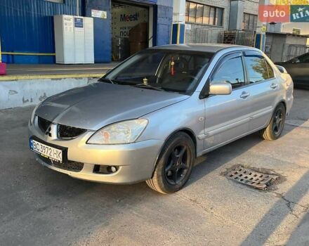 Сірий Міцубісі Lancer, об'ємом двигуна 1.58 л та пробігом 224 тис. км за 5000 $, фото 1 на Automoto.ua