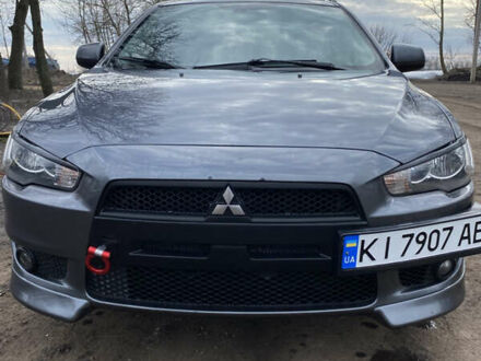 Мицубиси Лансер 2008 в Попольне на Automoto.ua Серый Мицубиси Лансер, объемом двигателя 2 л и пробегом 248 тыс. км за 6850 $, фото 1 на Automoto.ua
