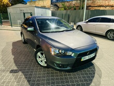 Сірий Міцубісі Lancer, об'ємом двигуна 2 л та пробігом 220 тис. км за 4750 $, фото 1 на Automoto.ua